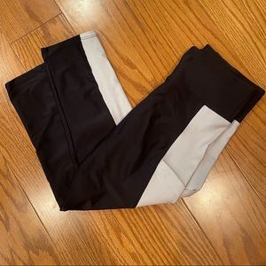 Onzie black crop with snakeprint side panels